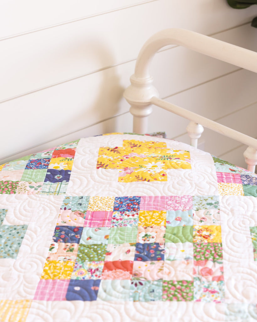 Quilt with colorful and patterned quilt blocks