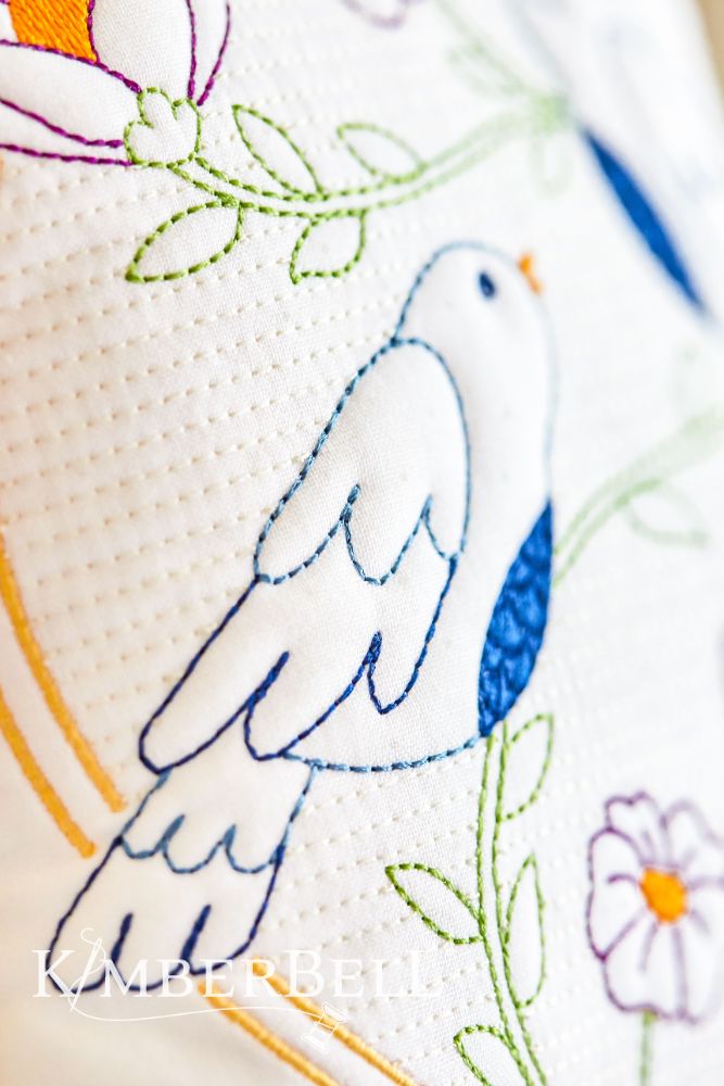 Kimberbell Embroidery Club - August 2024: Happy As a Lark Trapunto Pillow