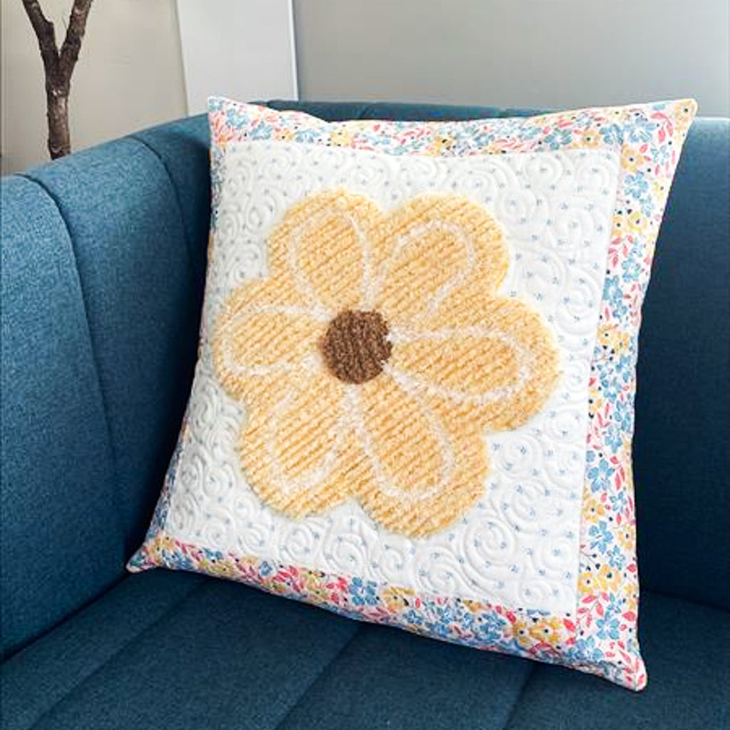 Chenille pillow with flower design