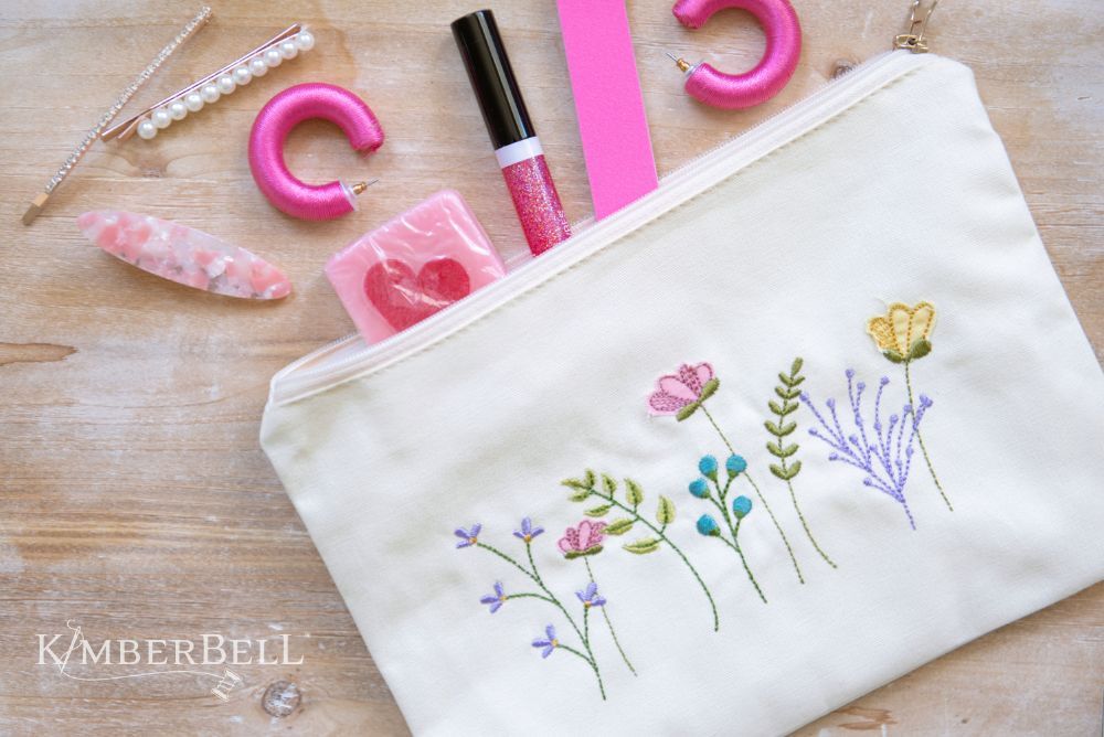 Canvas cream zipper pouch with embroidered flowers 